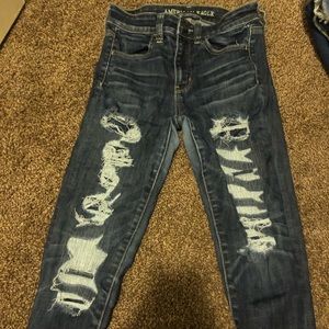 dark ripped high waisted jeans